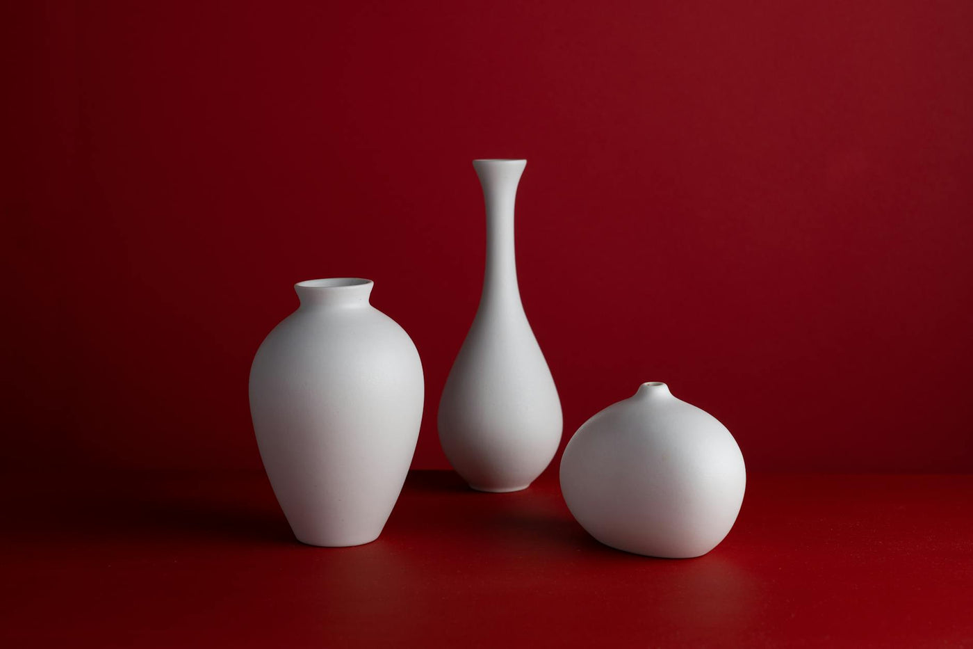 Minimalist contemporary art gallery space with abstract paintings