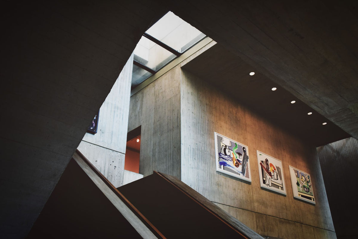 Modern art gallery interior during a contemporary art opening in Berlin