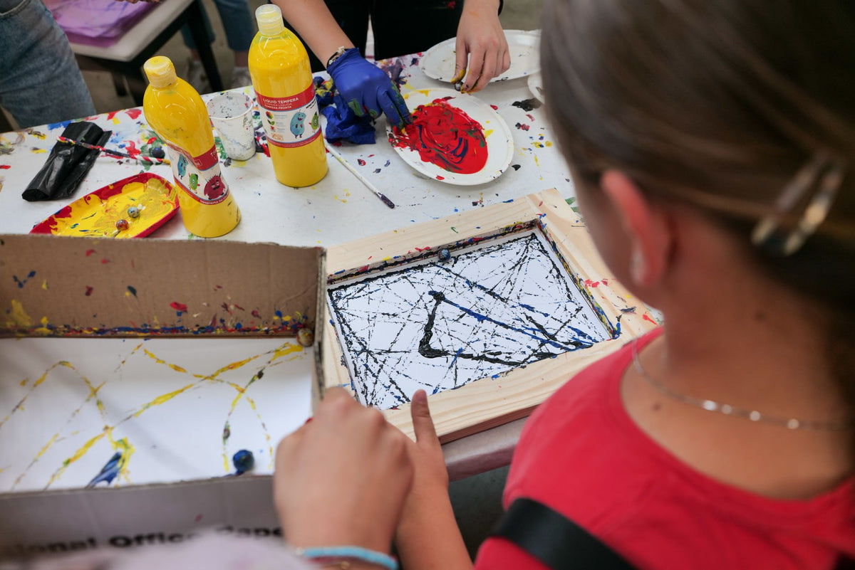 Artists collaborating in a Berlin studio space