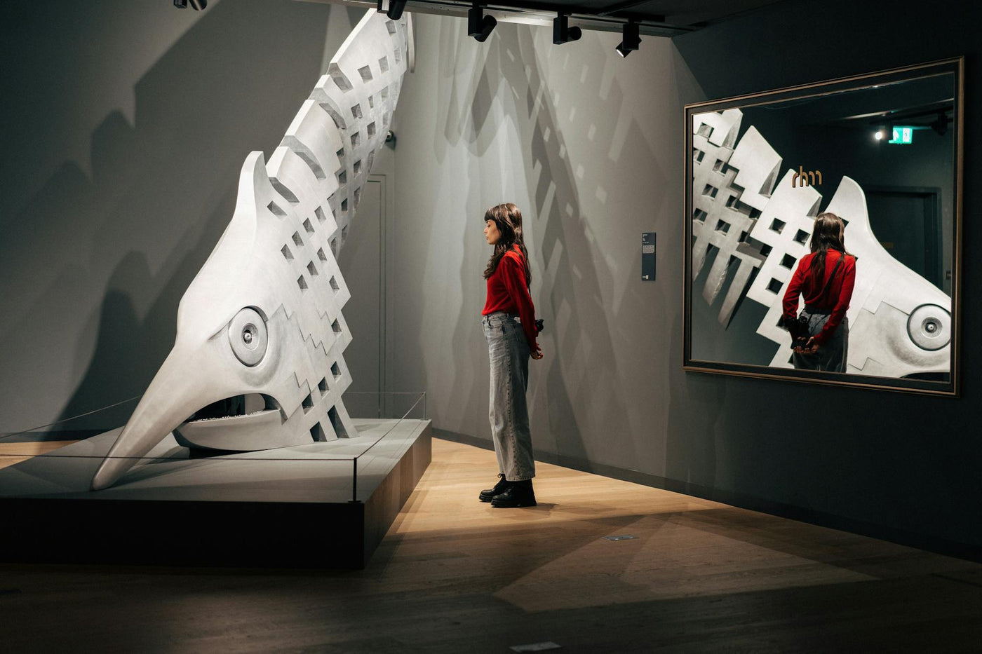 Contemporary art exhibition showcasing emerging Berlin artists in a minimalist gallery space