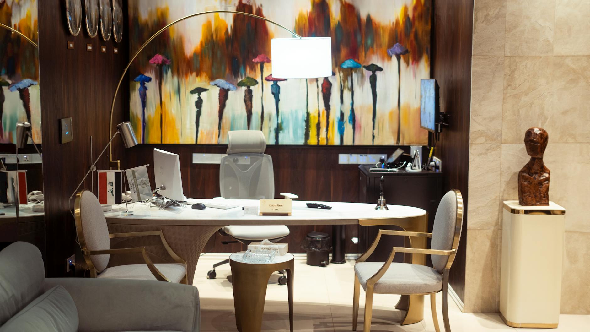 Modern office interior featuring abstract artwork on the wall