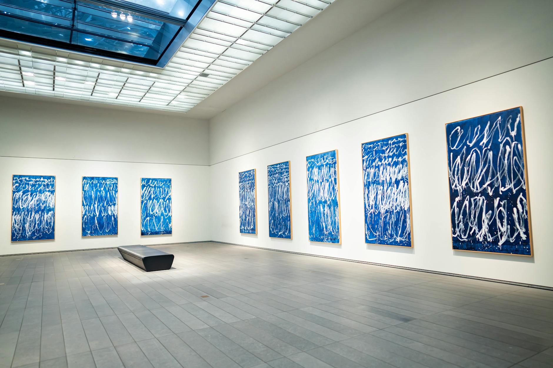 Modern art pieces displayed in a Berlin gallery showcasing emerging artists