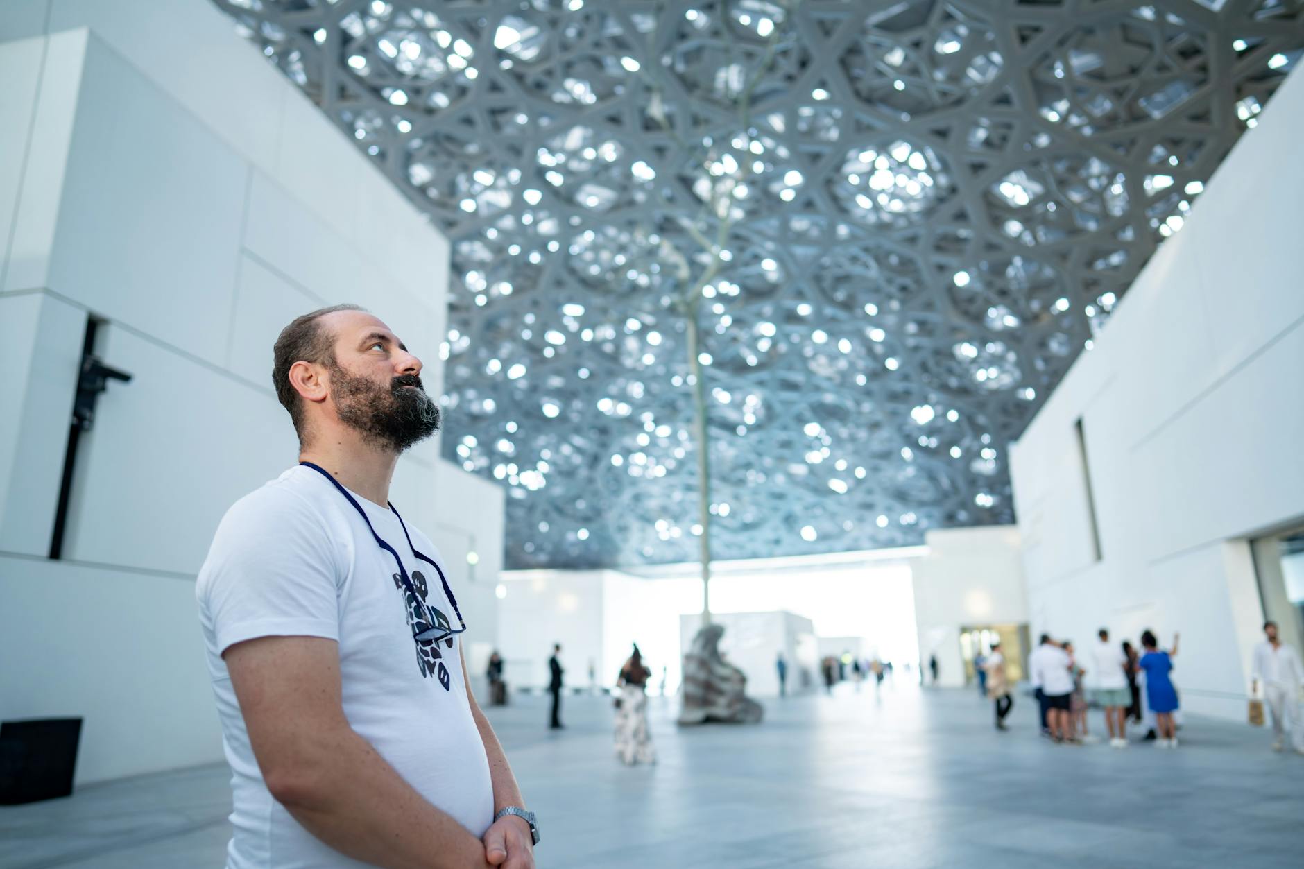 Interior of a contemporary Berlin art gallery showcasing limited edition artworks by emerging artists