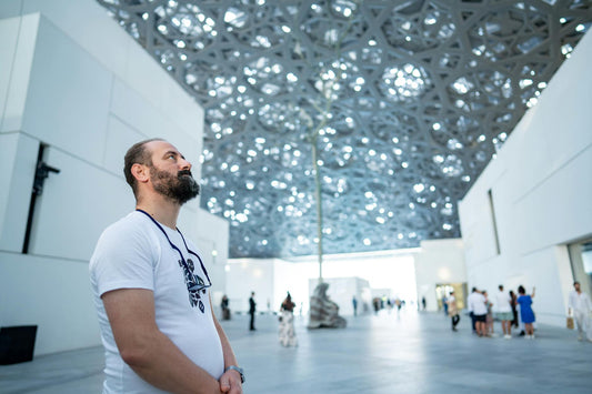 Interior of a contemporary Berlin art gallery showcasing limited edition artworks by emerging artists