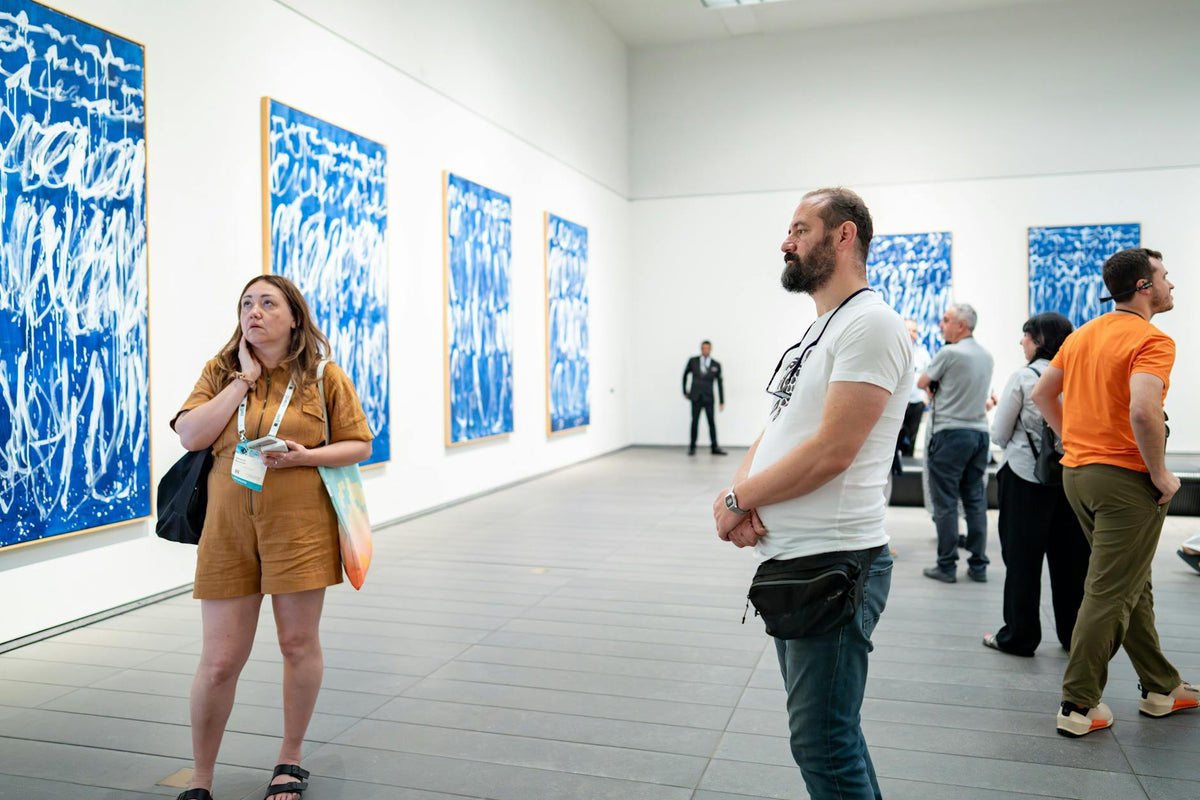 Contemporary art gallery space showcasing works by women artists