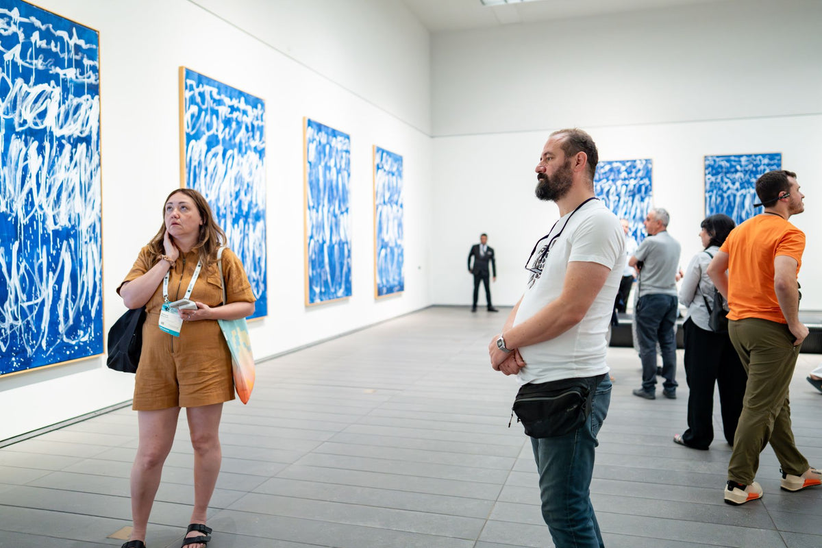 Modern art exhibition featuring emerging artists in a Berlin gallery