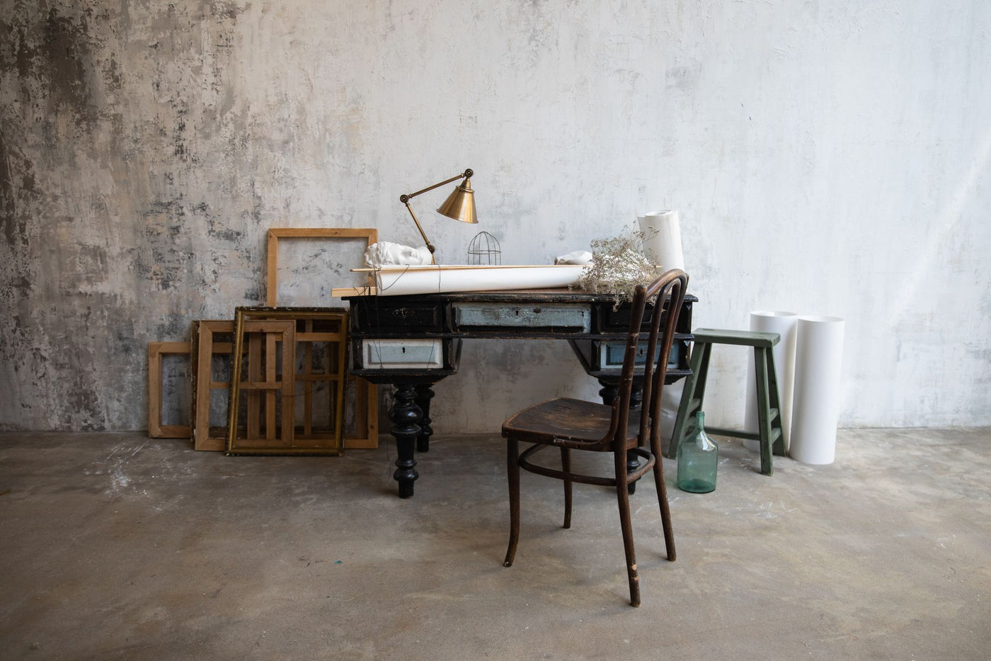 Minimalist art studio space in Berlin with natural light and modern furniture