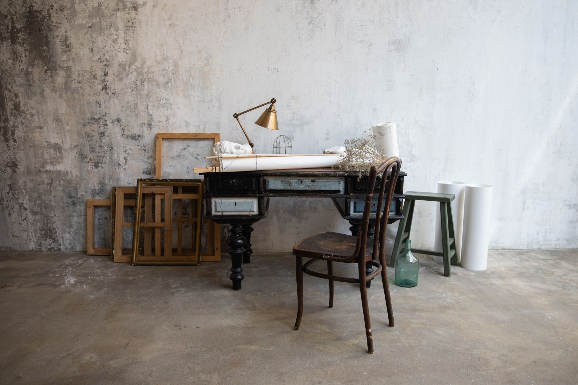 Minimalist art studio space in Berlin with natural light and modern furniture